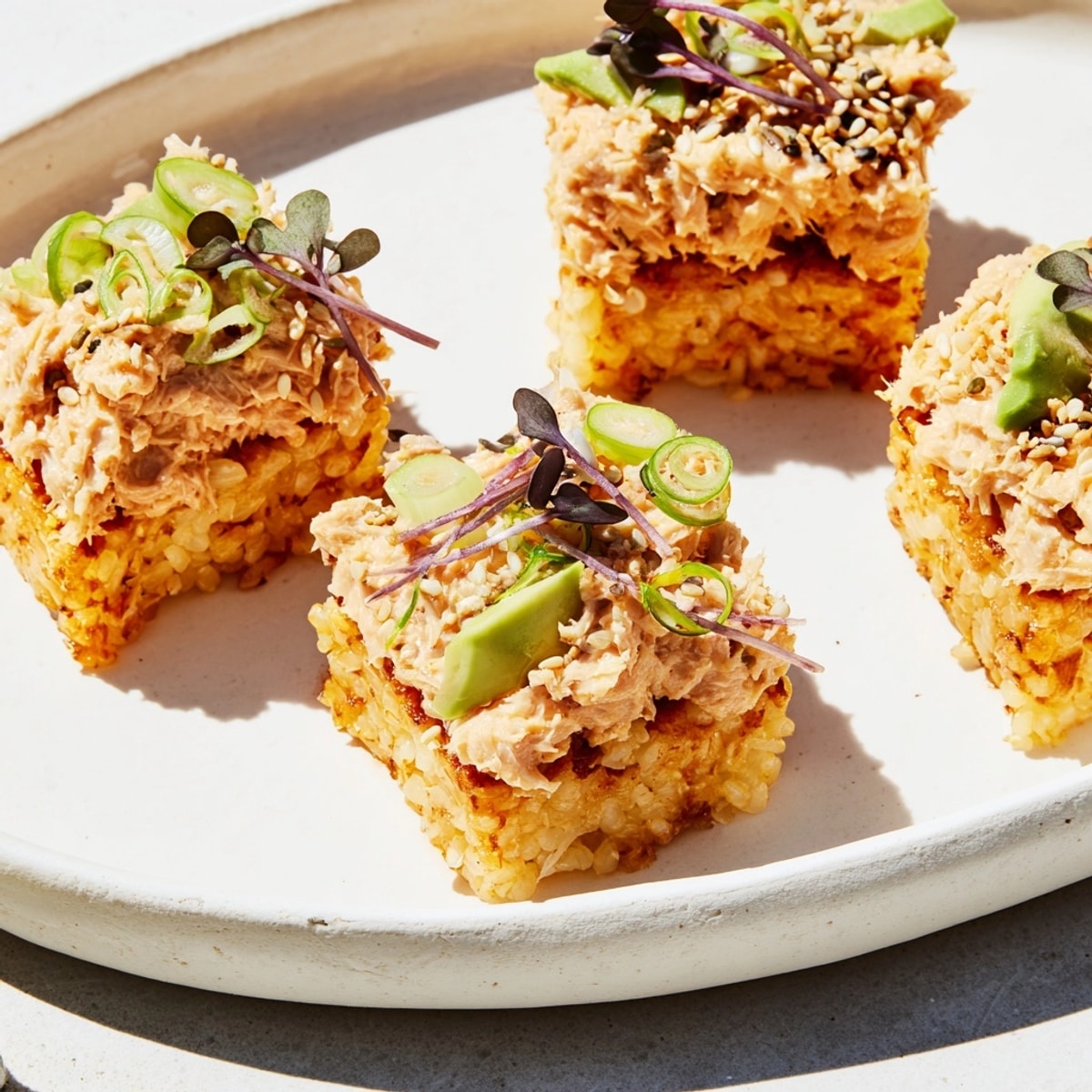 Close-up of Spicy Tuna Crispy Rice: each piece bursts with flavors, a Japanese-inspired treat.