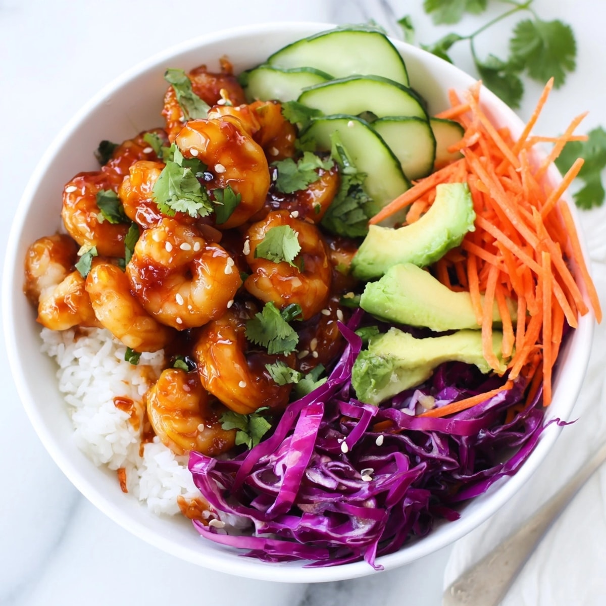 Golden Hot Honey Shrimp Bowls over fragrant rice, a spicy-sweet, delicious, easy dinner.