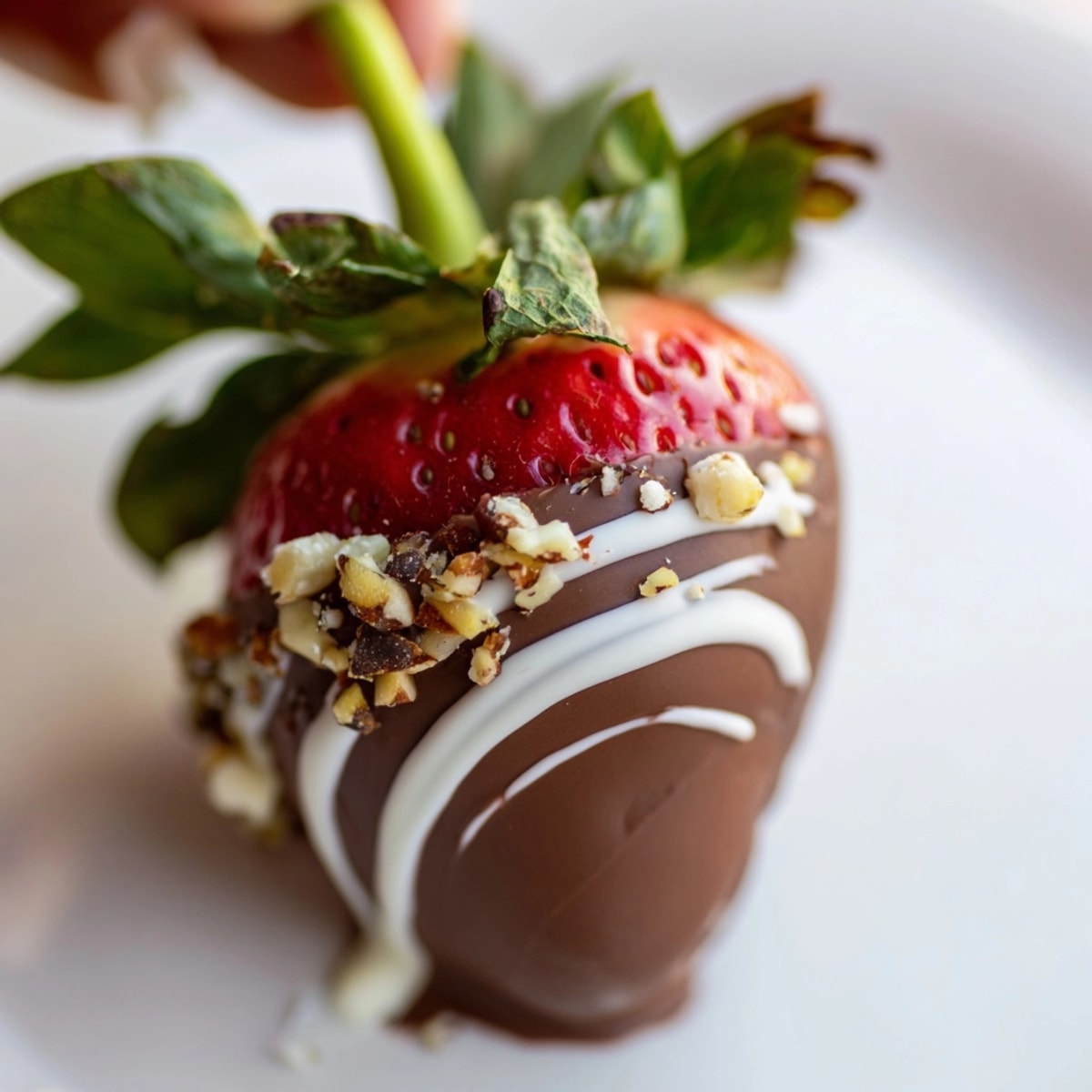 Hand-dipped Chocolate Covered Strawberries recipe: Ripe berries coated in smooth and creamy melted chocolate.