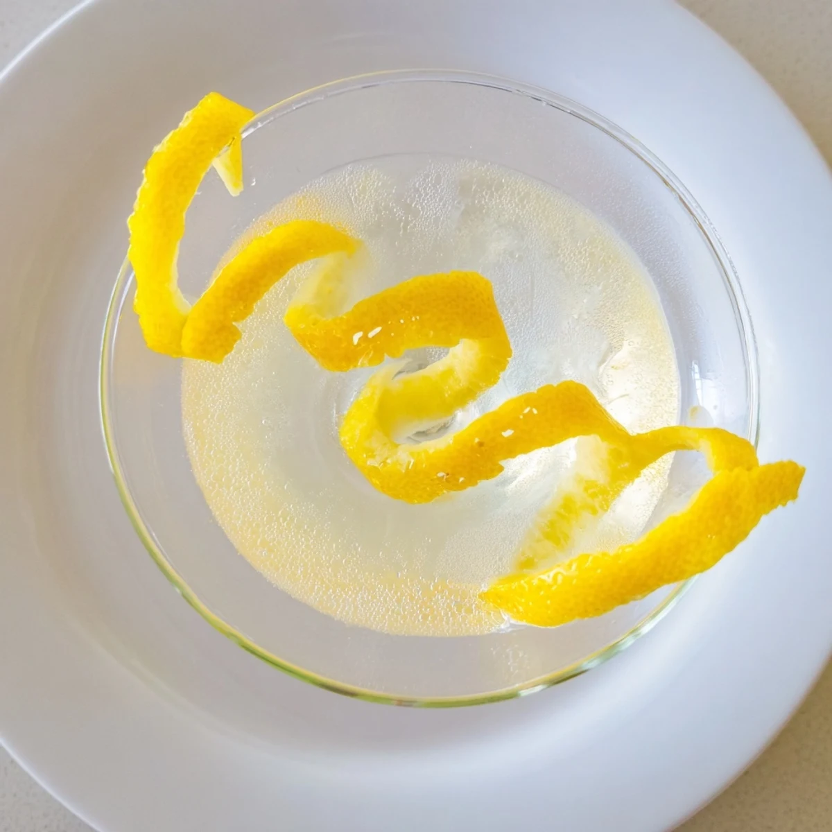 This refreshing Lemon Twist features a citrusy kick and is beautifully presented for serving.