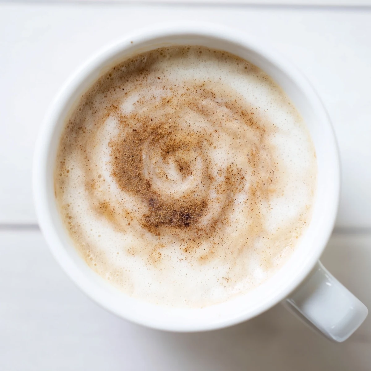 Steaming hot Creamy Milk poured into a mug, promising warmth and comfort on a cold day.