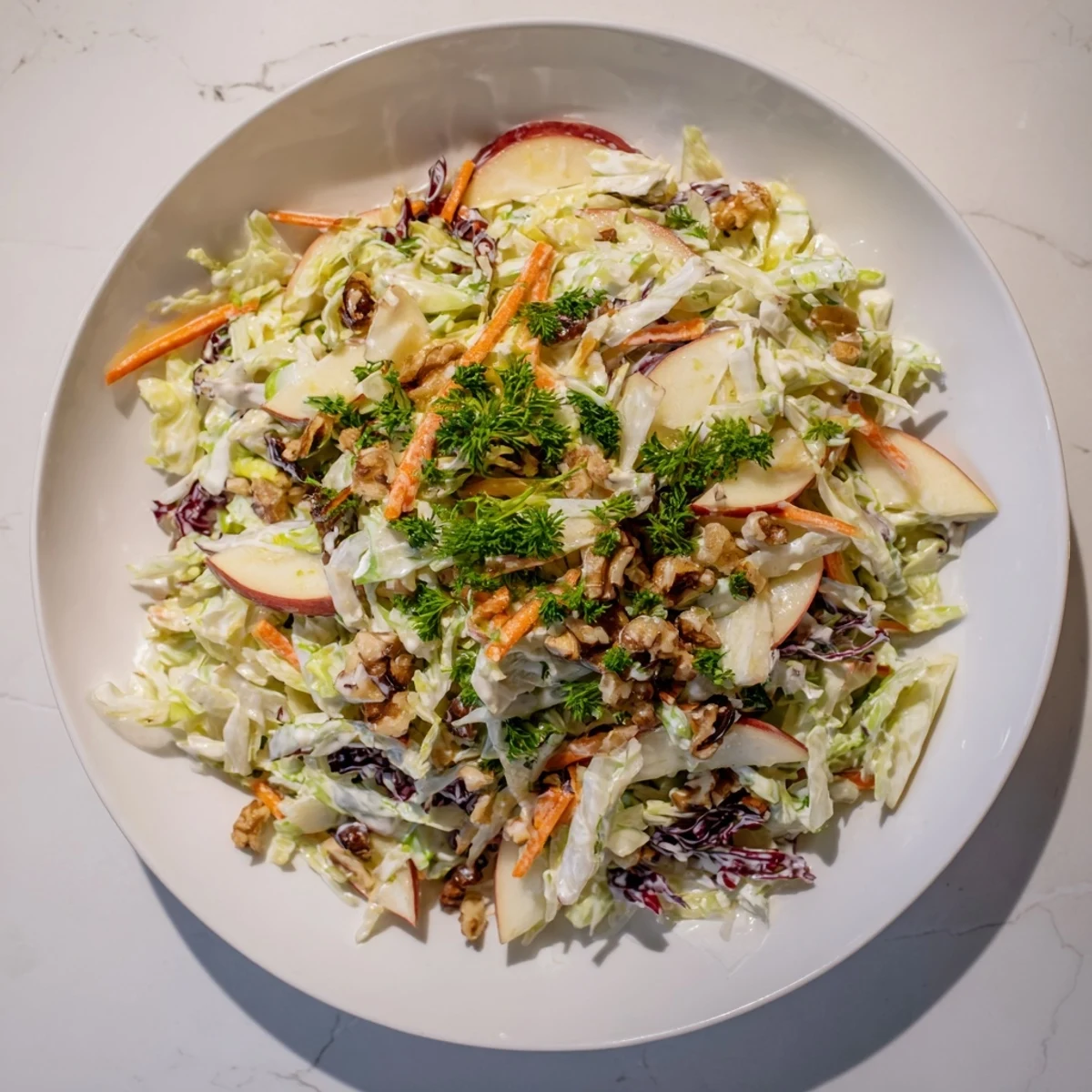 Freshly tossed Winter Coleslaw with Apple, offering a delightful mix of textures and flavors.