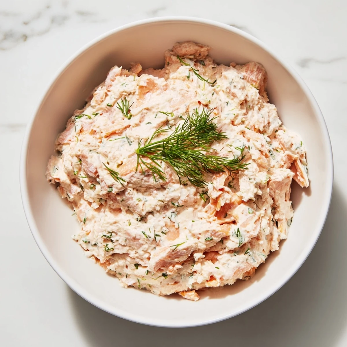 Creamy Smoked Salmon Pâté, served with crackers, a perfect elegant appetizer for sharing.