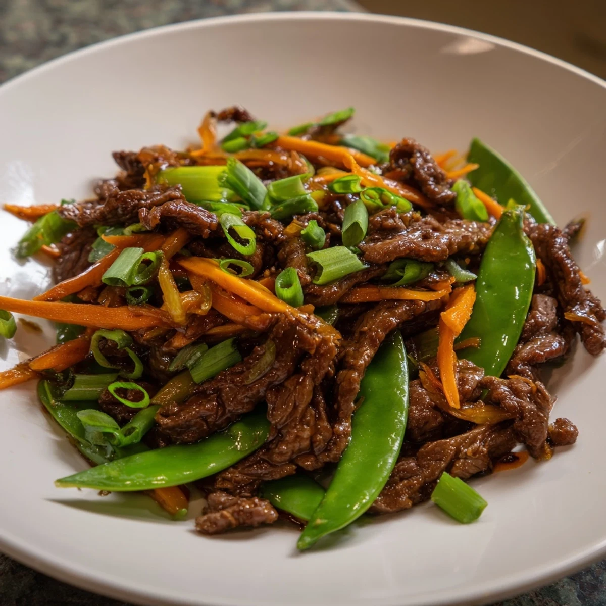 Delicious and easy weeknight meal idea: flavorful beef stir fry with vibrant vegetables.
