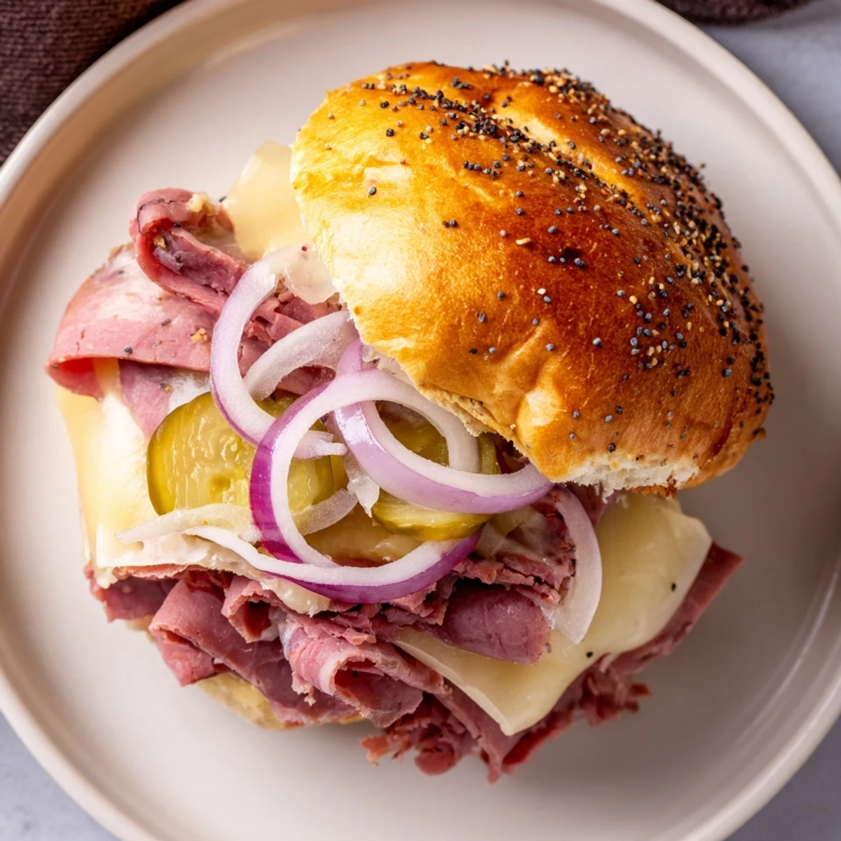 Freshly baked Corned Beef Sliders with Mustard, featuring savory corned beef and melty Swiss on buttery buns, ready to serve.