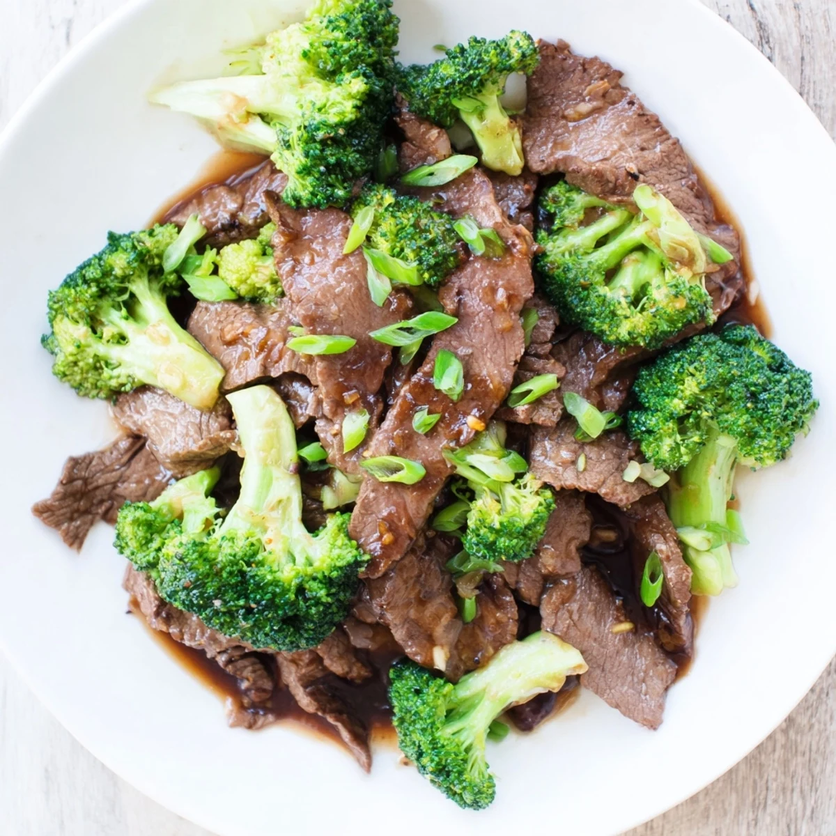 Tender beef slices and crisp broccoli in a glossy ginger sauce, served over steamed jasmine rice for a quick weeknight dinner.