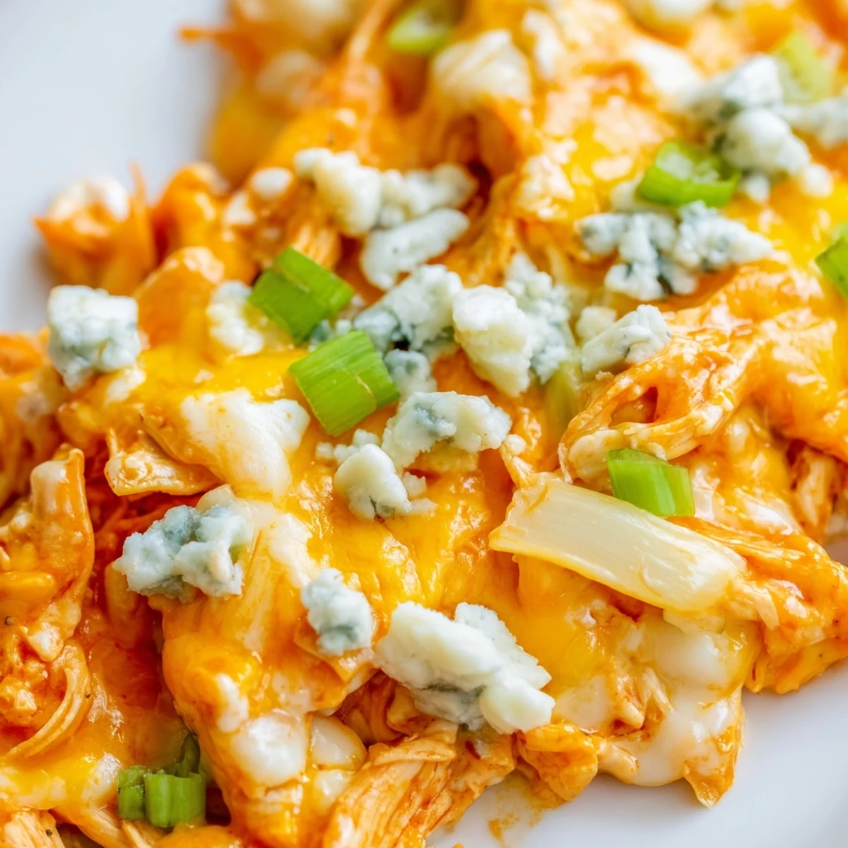 Golden bubbly Buffalo Chicken Cheese Bake fresh from the oven with melted cheese topping