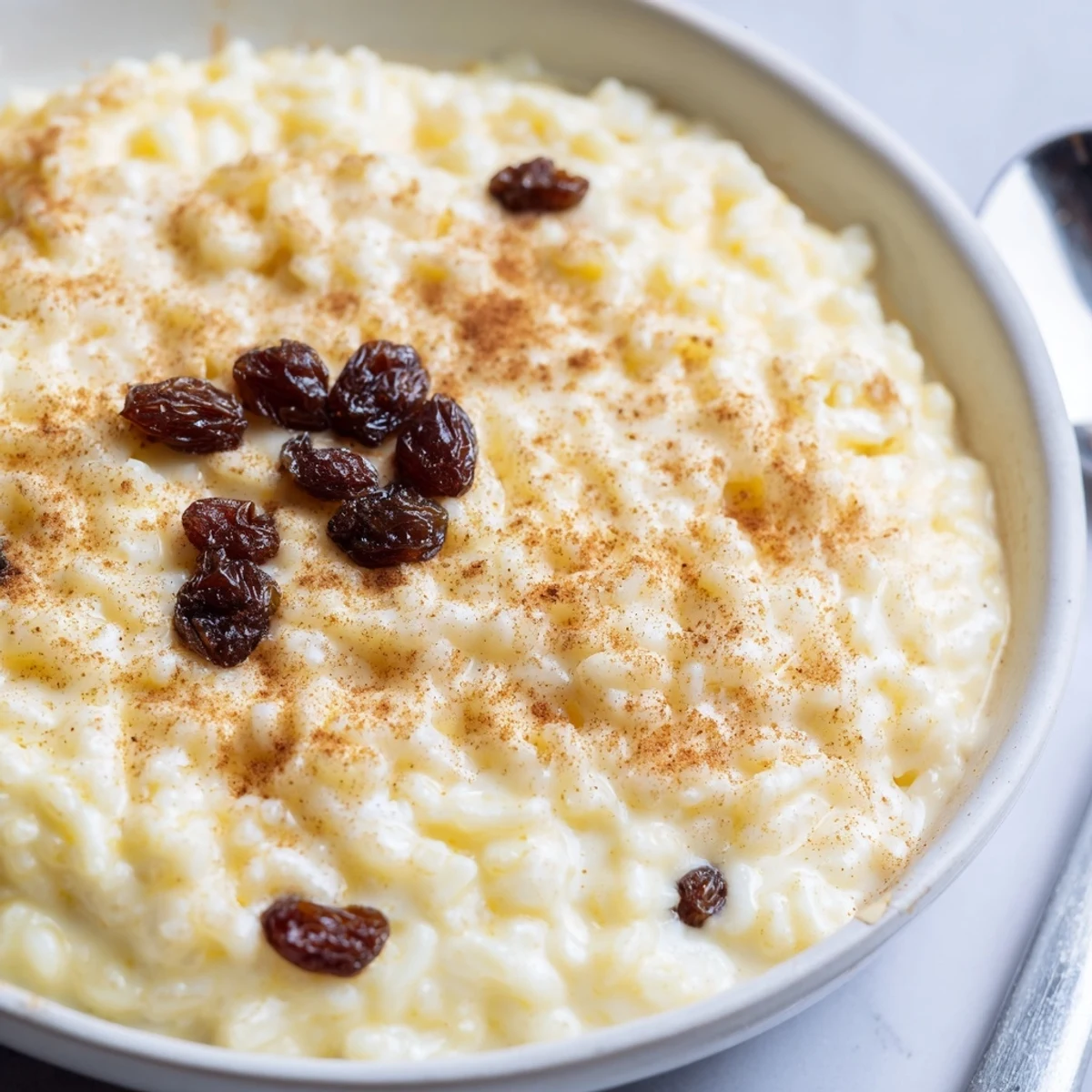 Delicious Condensed Milk Baked Rice Pudding Recipe To Try with creamy, golden surface.