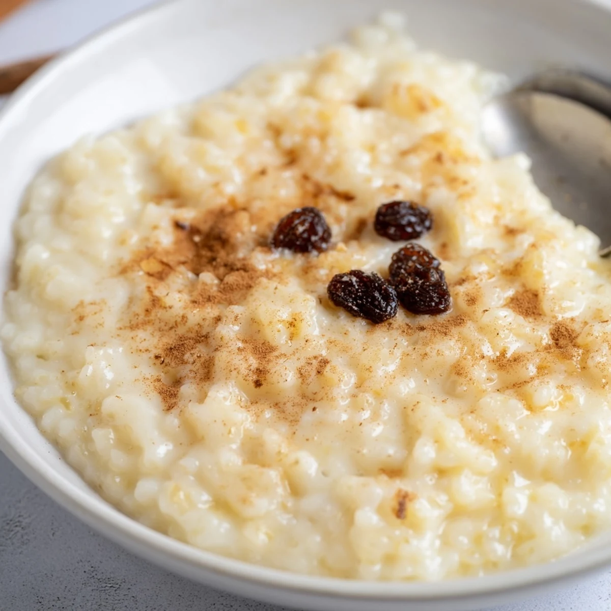 Delicious Condensed Milk Baked Rice Pudding Recipe To Try served chilled with fresh berries.