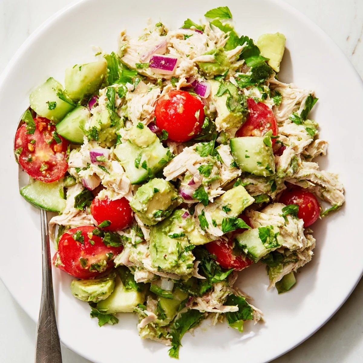 Serve Avocado Chicken Salad on mixed greens or in crunchy lettuce wraps